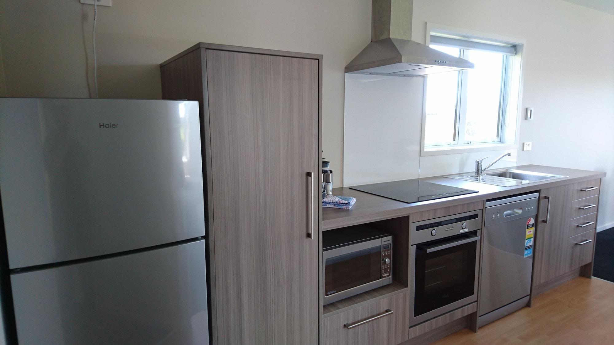 Taupo Debretts Spa Resort Екстер'єр фото A typical kitchen in a student apartment